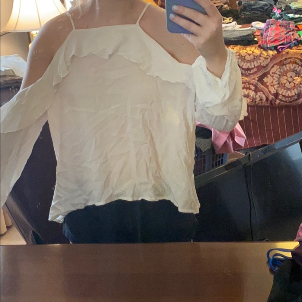 Open shoulder top with ruffles and sleeves